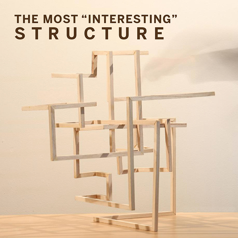 Two people viewing artwork in a gallery